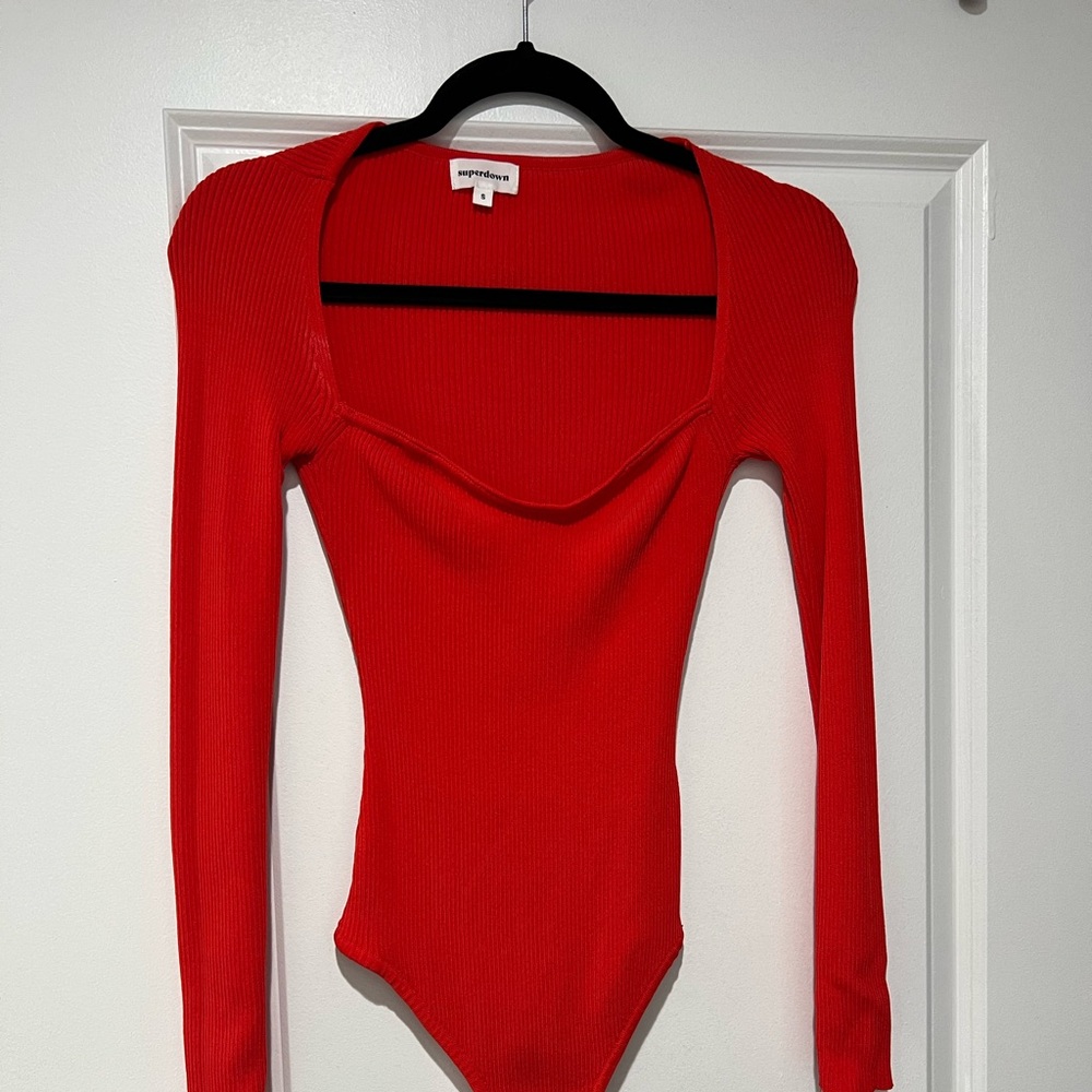 RED SUPERDOWN BODYSUIT